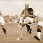 Dhyan chand with the ball vs. france in the 1936 olympic semi finals wiki.jpg