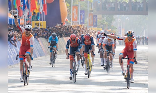 23janpic3 stg4 chinas li ning star riders aliaksei shnyrko r and cameron scott l celebrates their te.jpeg